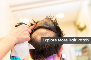 Rear view close-up of a Hairdresser removing the capillary prosthesis of a client using water spray